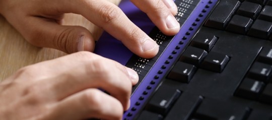 Computer with braille keyboard