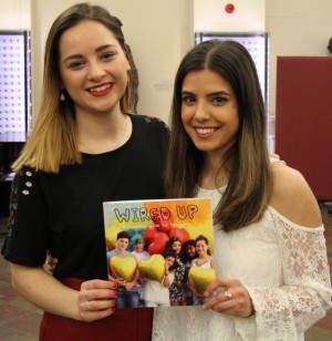 Katie Miller (left) and Hannah Phillips with the Wired Up booklet.
